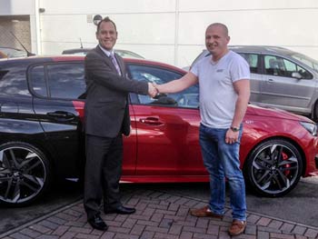 customer-collects-our-first-peugeot-308-gti-from-aldershot-dealership-c